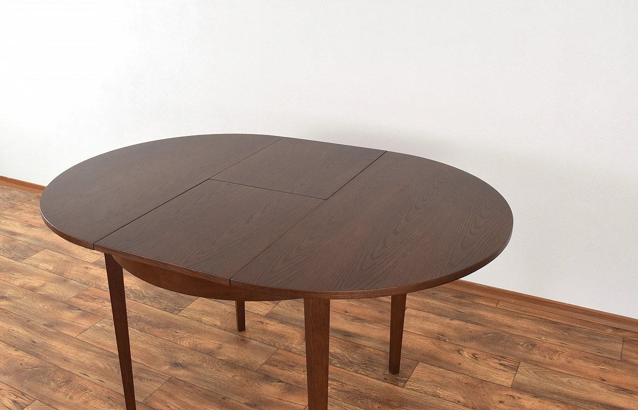 Oak extendable table by Jarocińskie Fabryki Mebli, 1960s 12