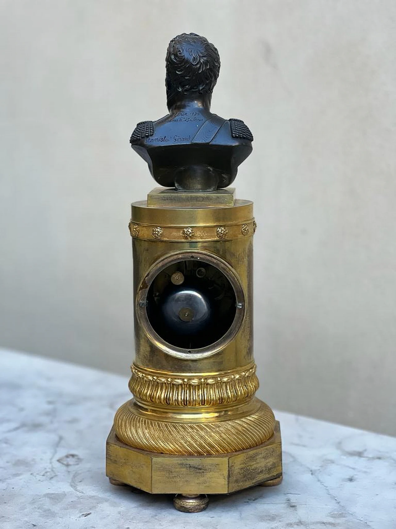 Clock in gilt bronze and bronze bust, 19th century 1