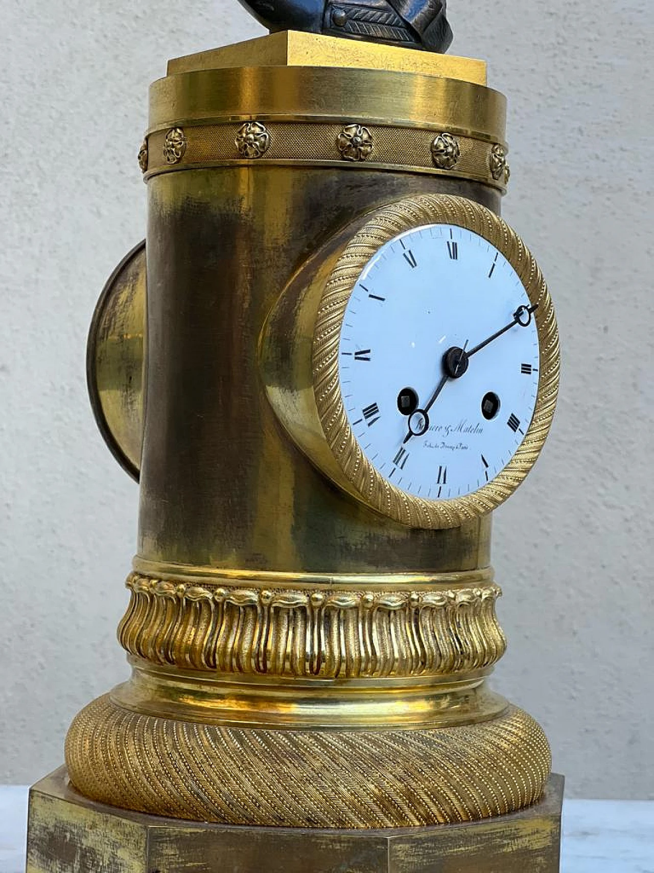 Clock in gilt bronze and bronze bust, 19th century 12