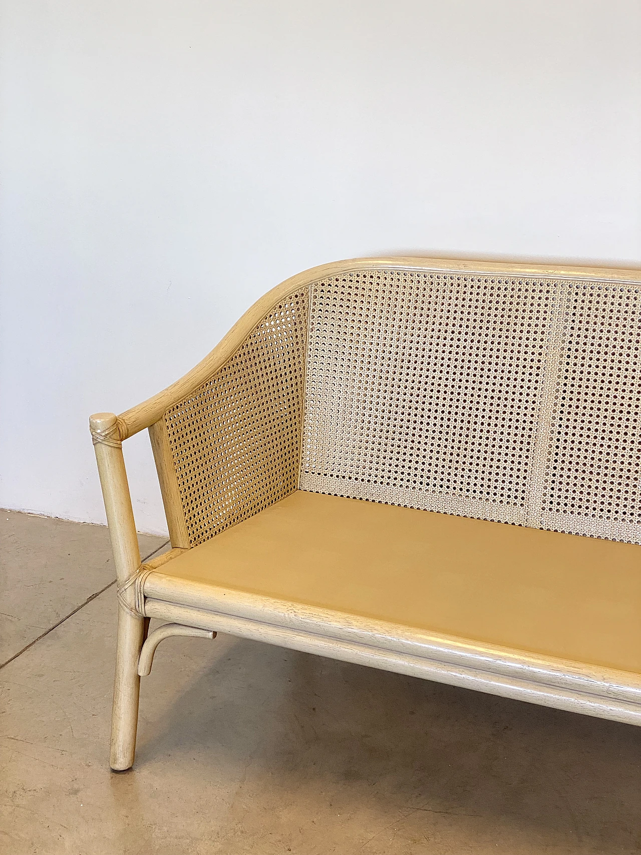 Sofa in laquered wood and Vienna straw with cushions by McGuire, 1970s 3