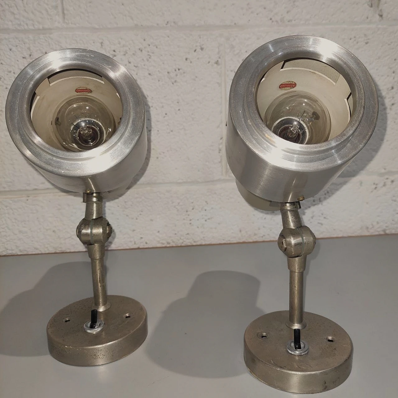 Pair of metal adjustable wall lights by Stilnovo, 1950s 4