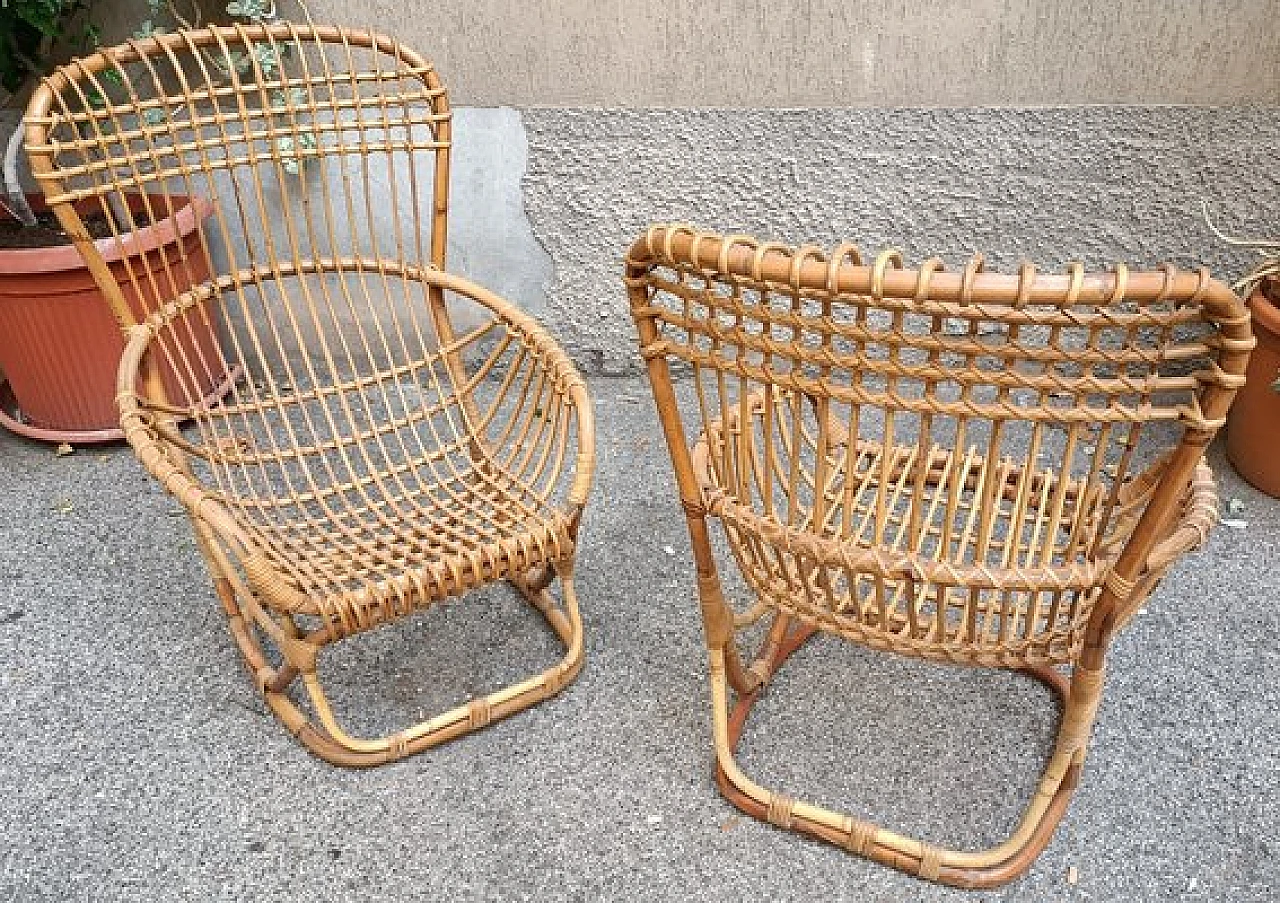 Pair of P04 armchairs in rattan by Tito Agnoli for P. Bonacina, 1960s 2