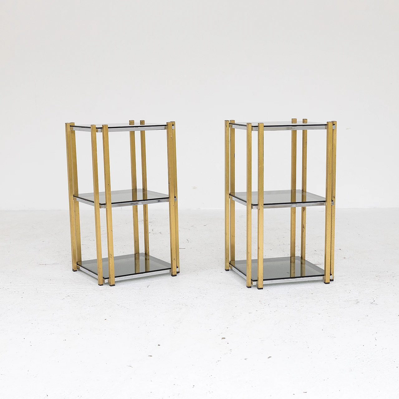 Pair of chromed and gilded metal and smoked glass coffee tables, 1970s 2