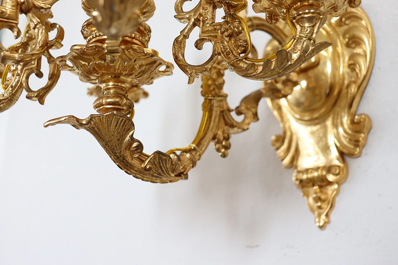 Pair of five-light gilded bronze wall lamps 13