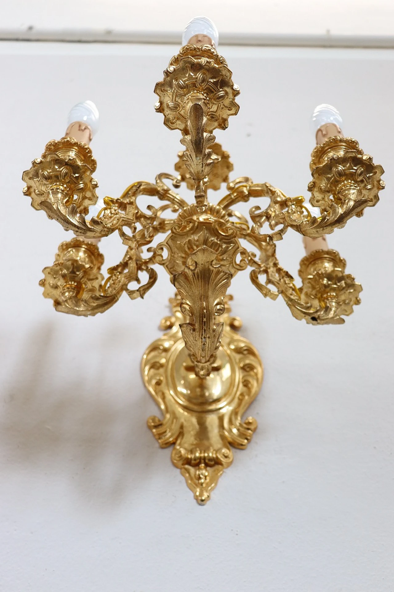 Pair of five-light gilded bronze wall lamps 16