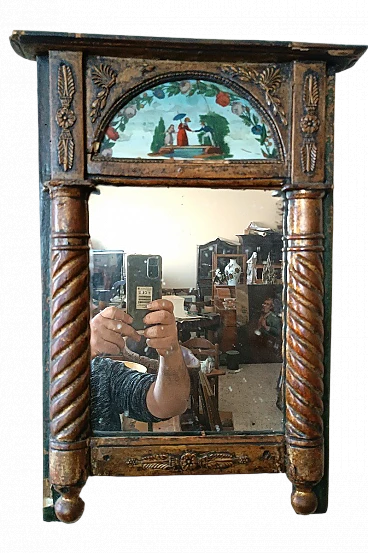 Empire gilded wood mirror with painted glass, early 19th century