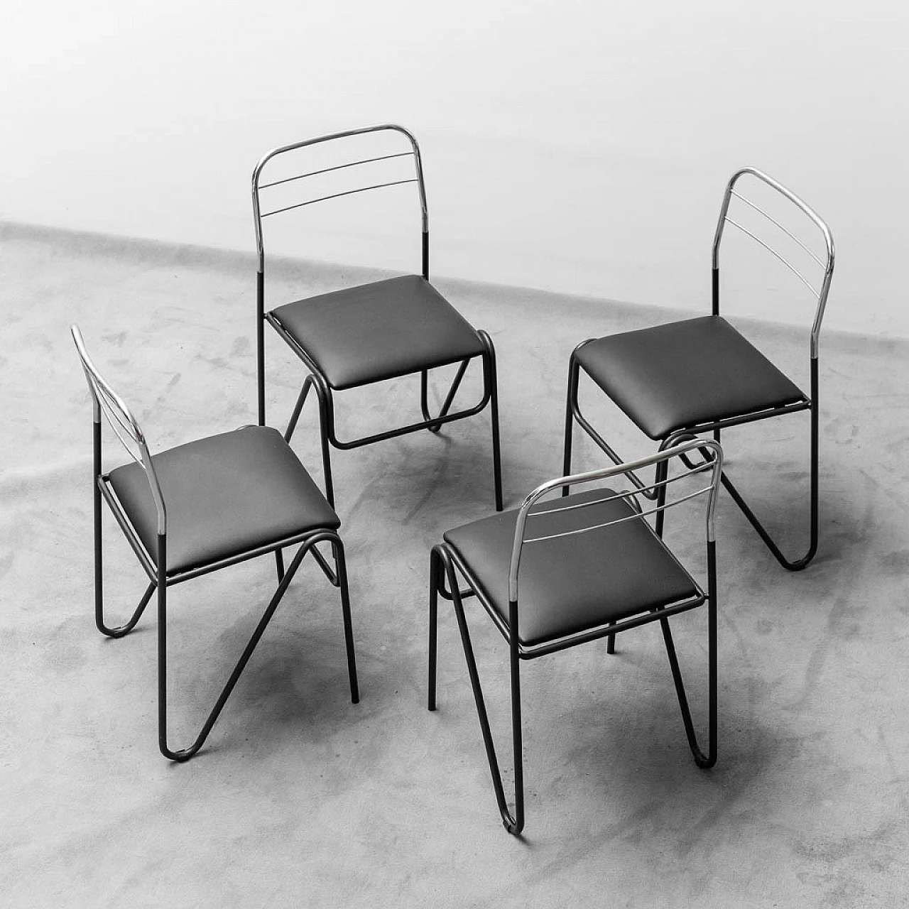 4 Ecoleather and metal chairs, 1970s 1