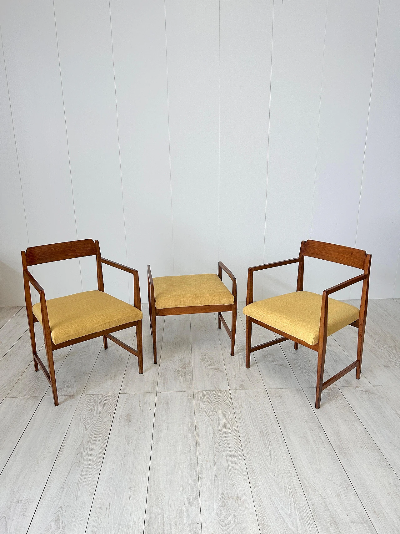 Pair of wood and fabric armchairs with footstools, 1950s 4