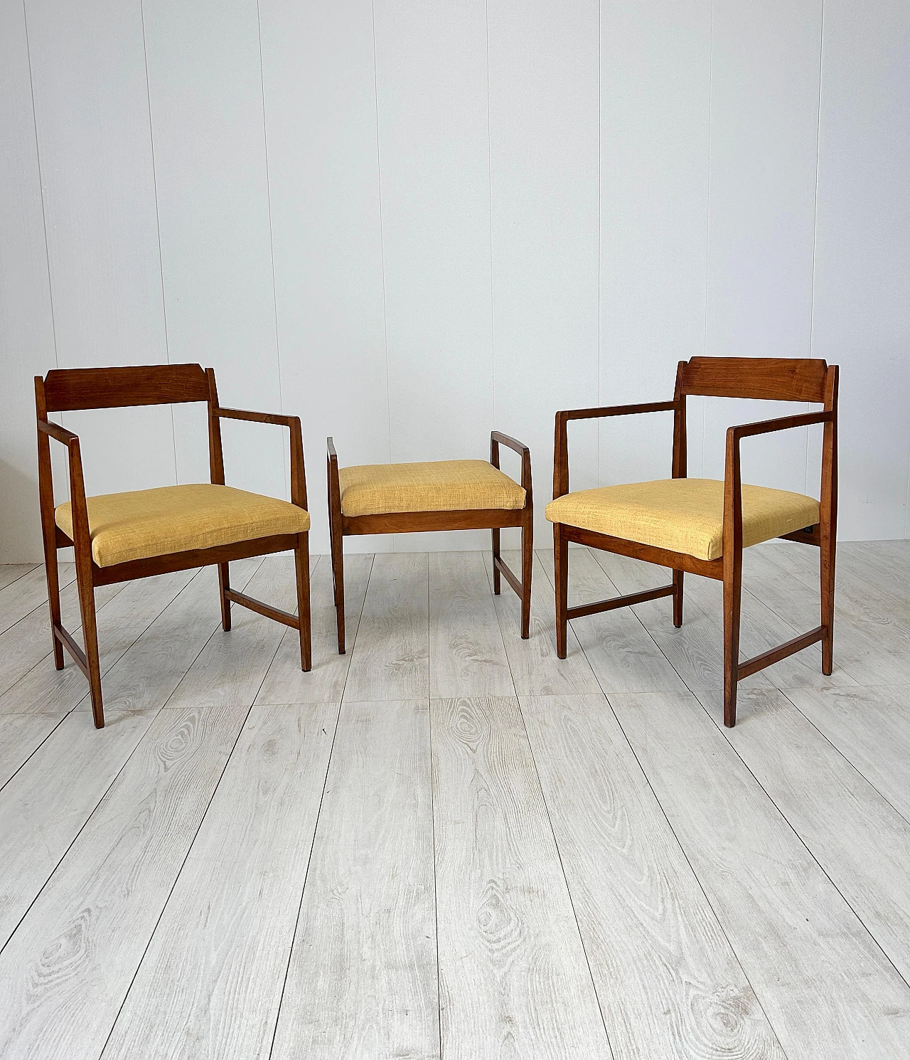 Pair of wood and fabric armchairs with footstools, 1950s 5