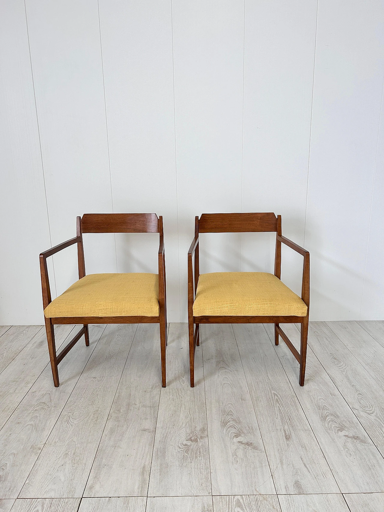 Pair of wood and fabric armchairs with footstools, 1950s 8