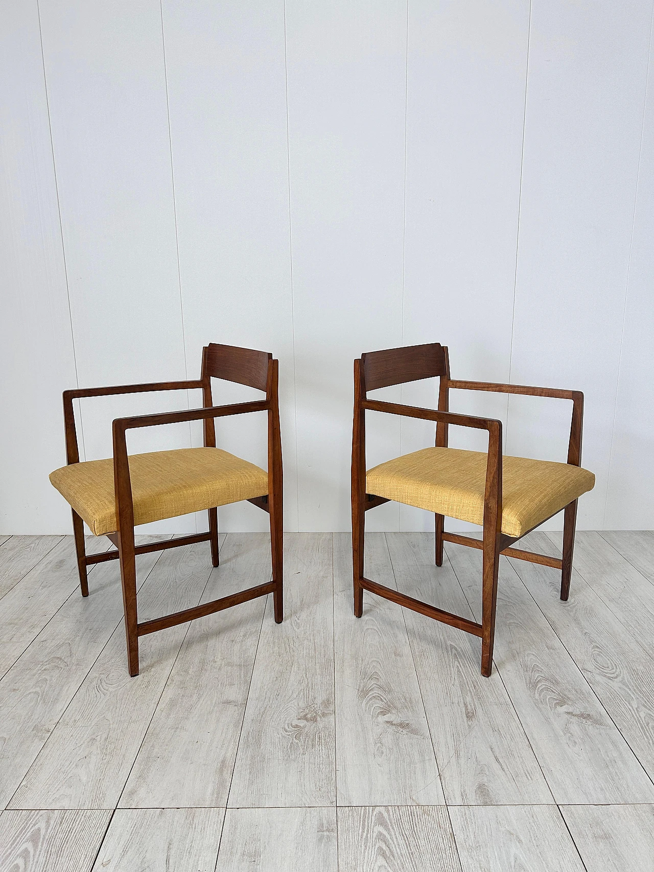 Pair of wood and fabric armchairs with footstools, 1950s 9