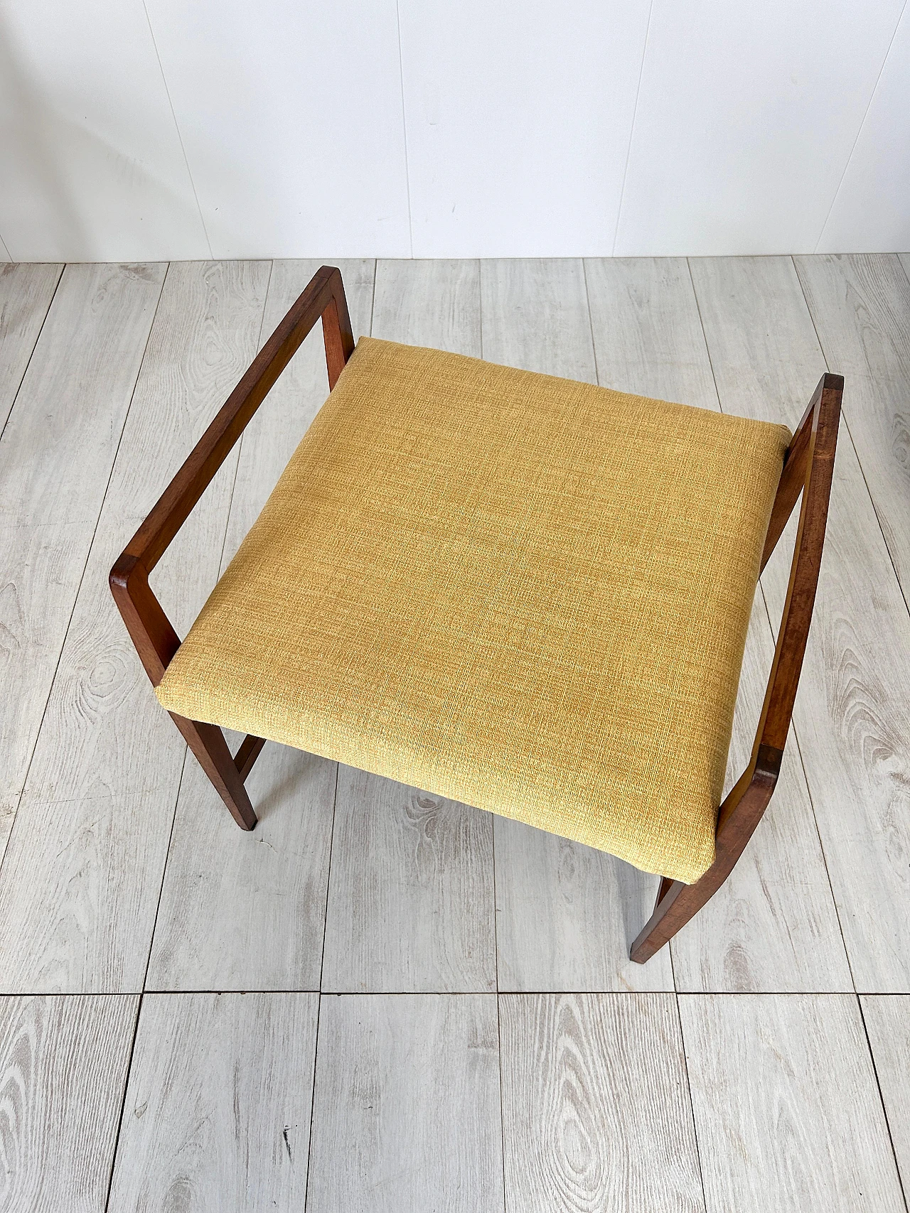 Pair of wood and fabric armchairs with footstools, 1950s 11