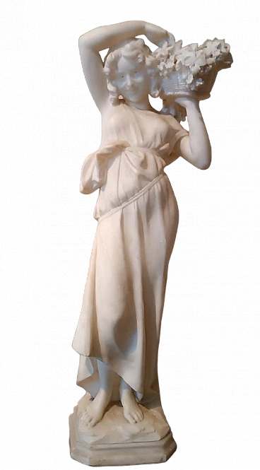 Girl with basket of flowers, alabaster sculpture, early 20th century