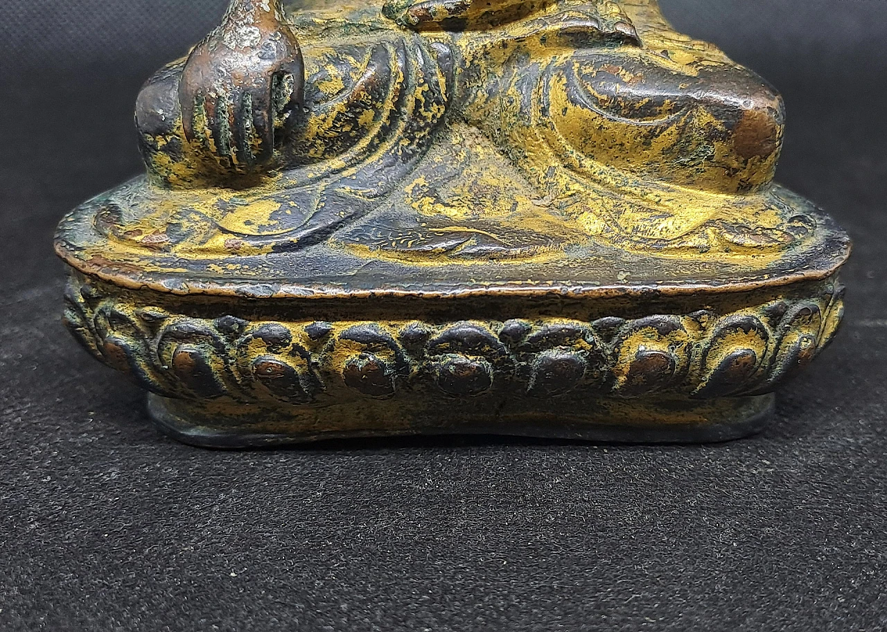 Bronze sculpture of Buddha Sakyamuni on flower-shaped base 9