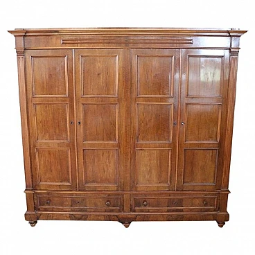 Four-door wardrobe in solid walnut, second half of the 19th century