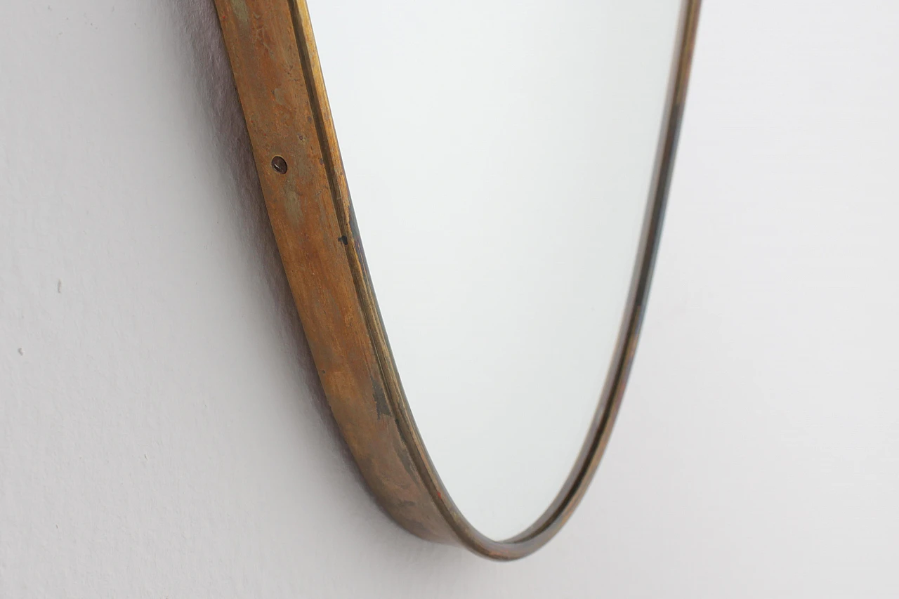Shield-shaped wall mirror with brass frame in G. Ponti style, 1950s 11