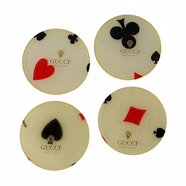 4 Plexiglass coasters with card suits by Gucci, 1980s