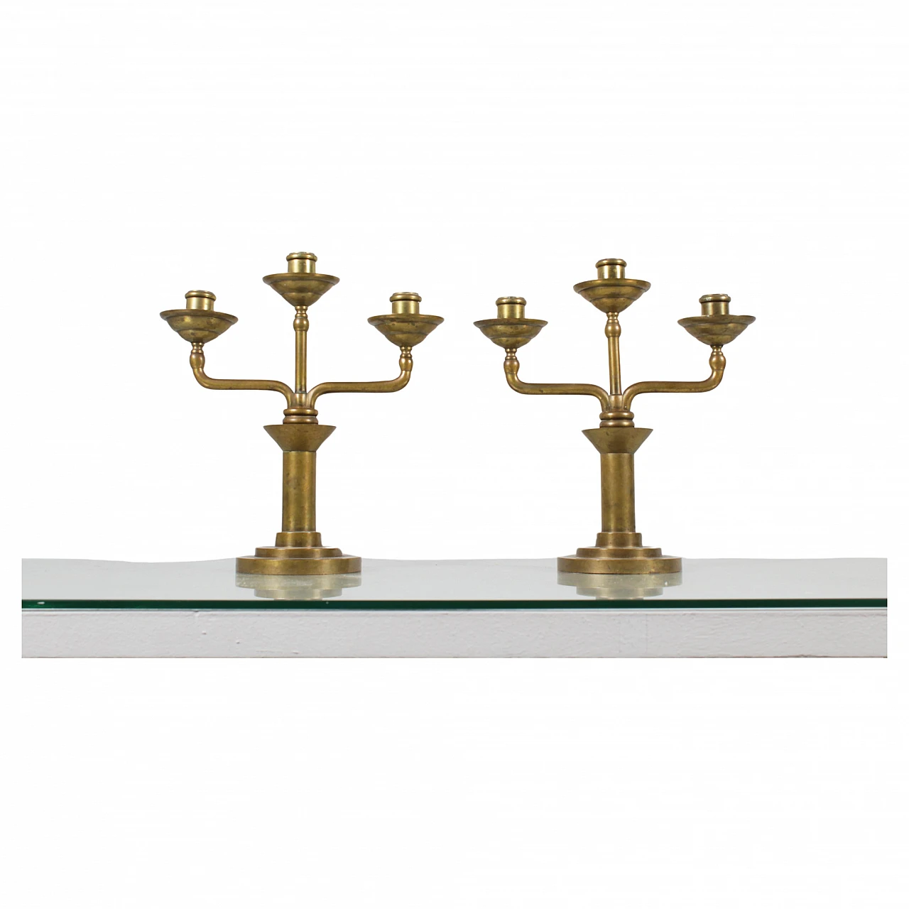 Pair of turned solid brass candelabra, 1930s 1