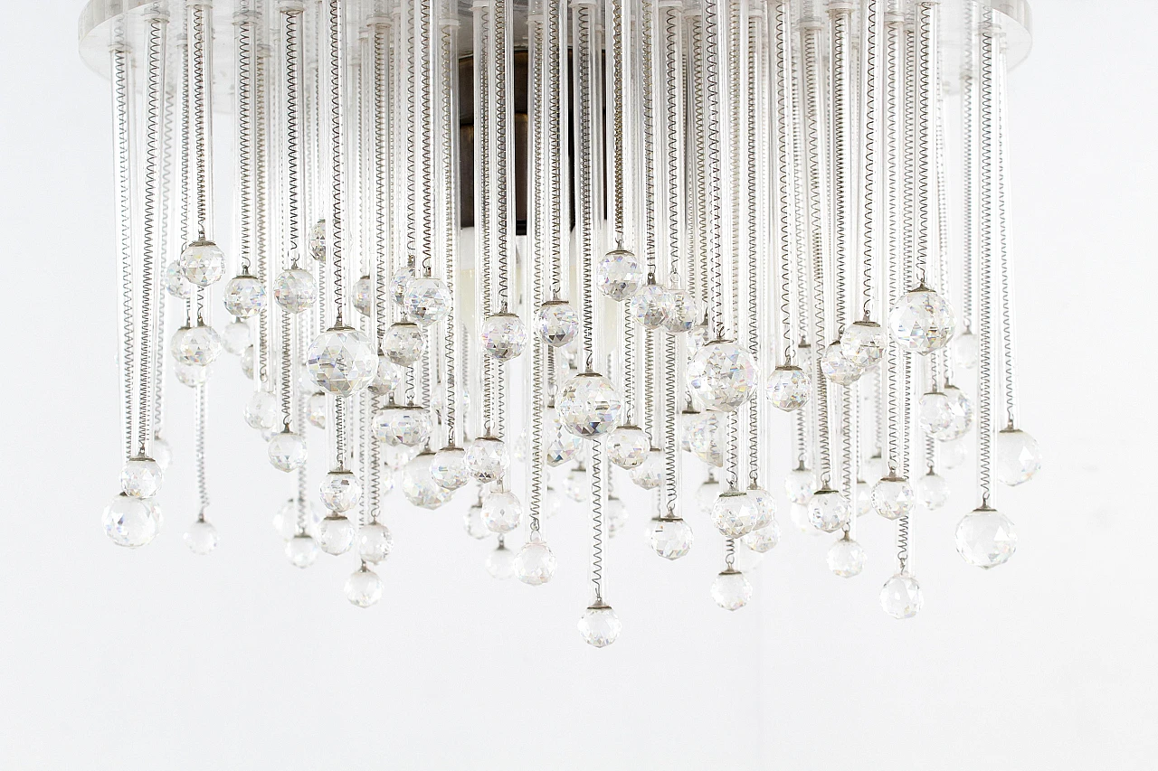 Pair of plexiglass, glass, crystal and brass chandeliers, 1960s 11