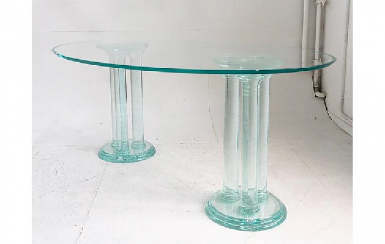 Oval glass dining table with acrylic glass column legs, 1970s 2