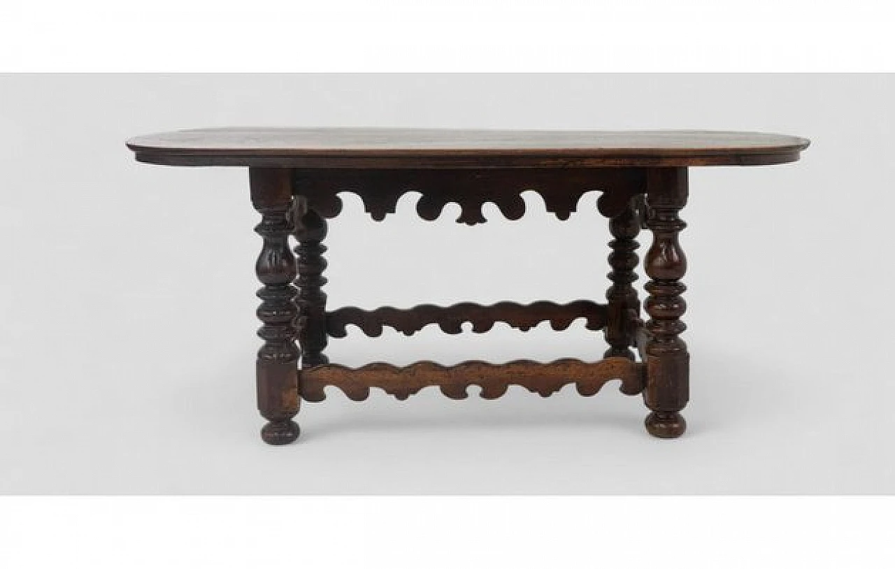 Wooden table with oval top and carved legs, 19th century 2