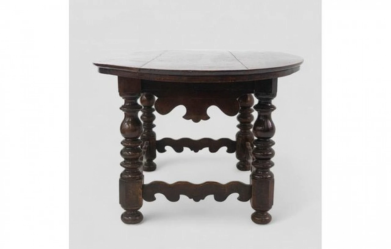 Wooden table with oval top and carved legs, 19th century 3