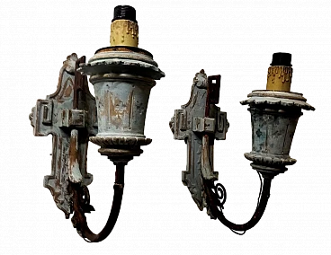 Pair of lacquered wood and wrought iron wall lights, late 19th century