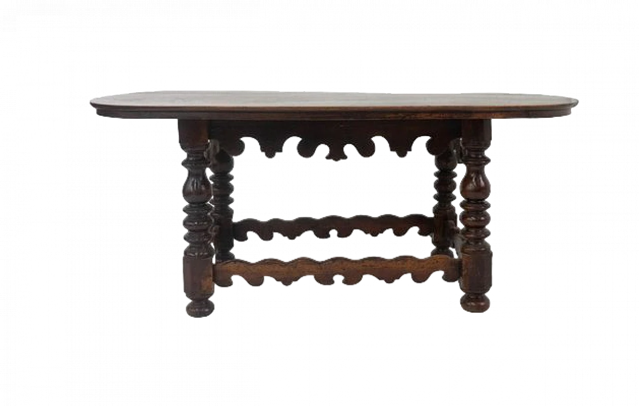 Wooden table with oval top and carved legs, 19th century 6