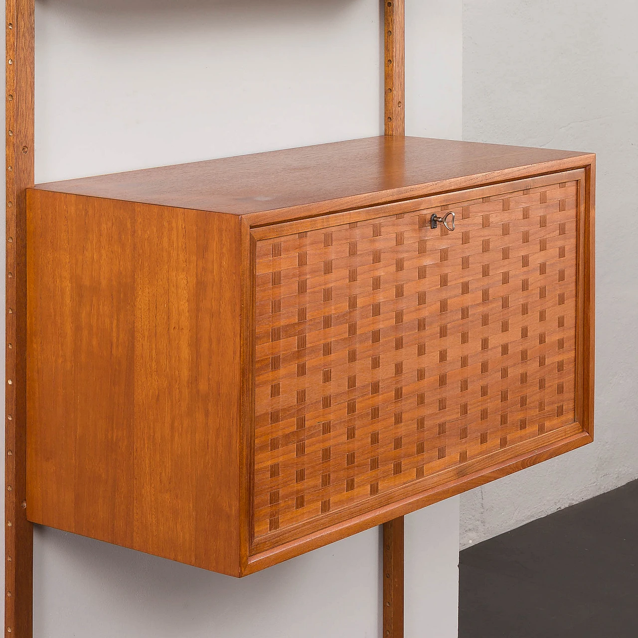 Hanging bookcase with writing desk by Poul Cadovius for Cado, 1960s 17