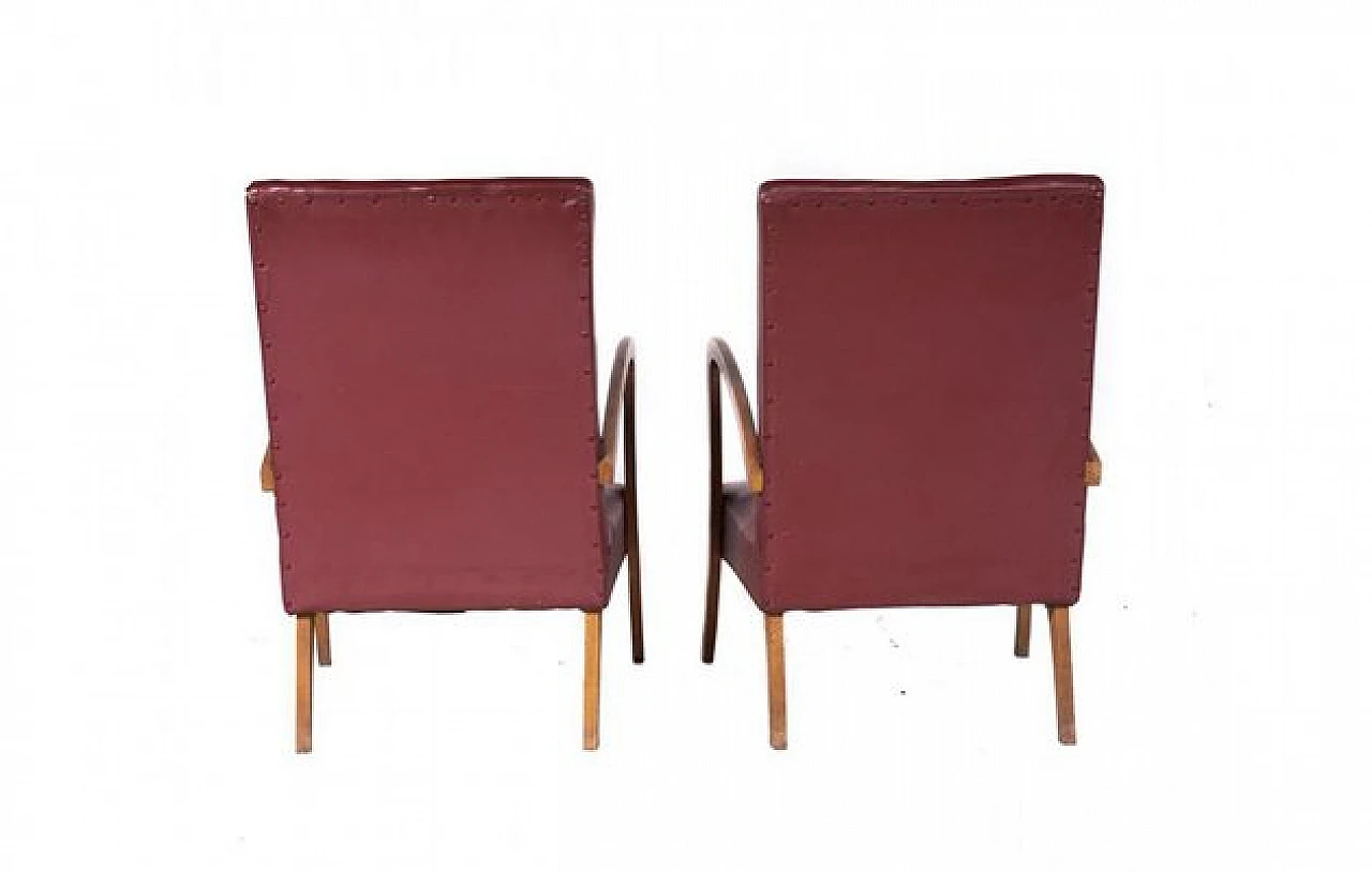 Pair of armchairs in wood and burgundy leatherette, 1970s 4