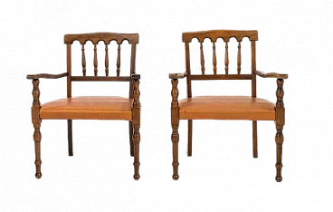 Pair of wooden armchairs with leatherette seat, 1970s