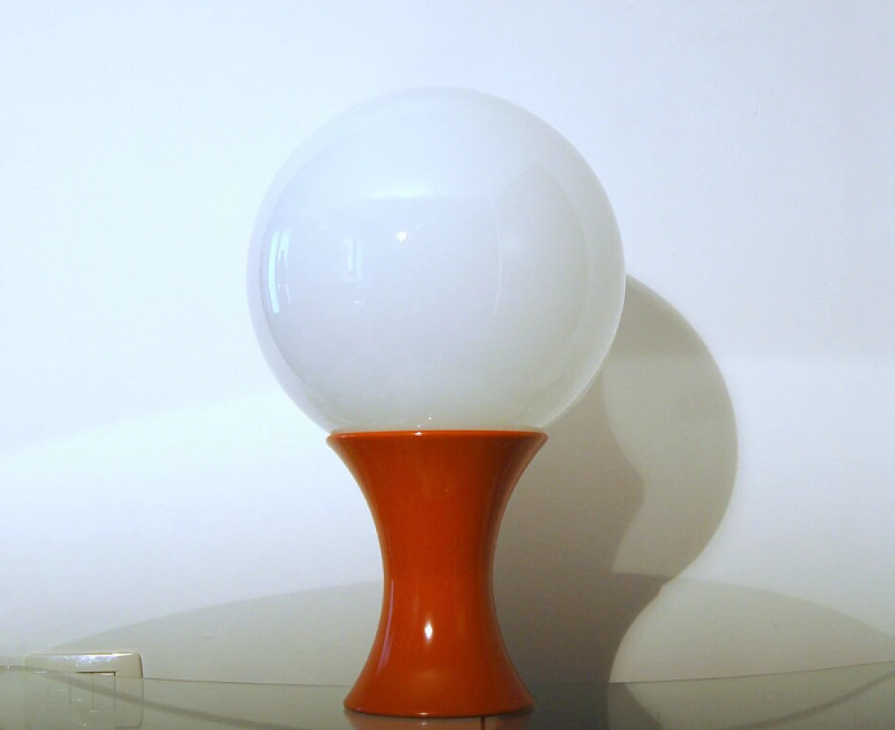Table lamp with orange metal & glass sphere by Stilnovo, 1960s 3
