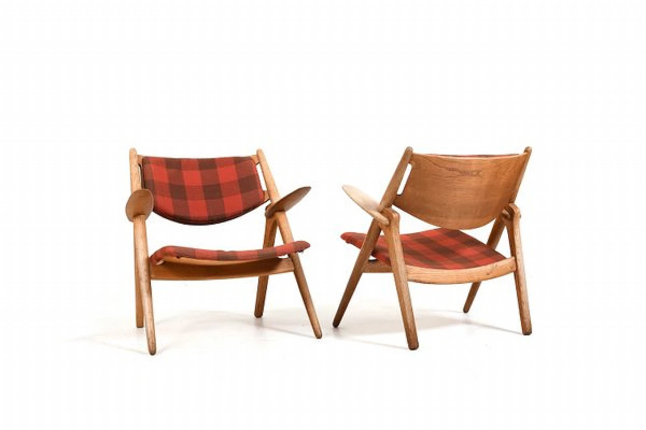 Pair of armchairs CH-28 by H. J. Wegner for C. Hansen & Son, 1950s 4