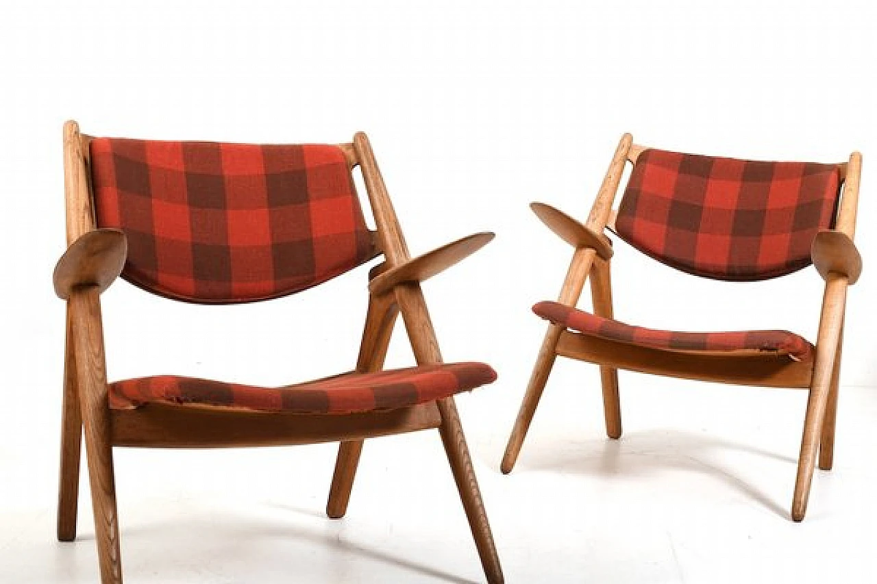 Pair of armchairs CH-28 by H. J. Wegner for C. Hansen & Son, 1950s 12