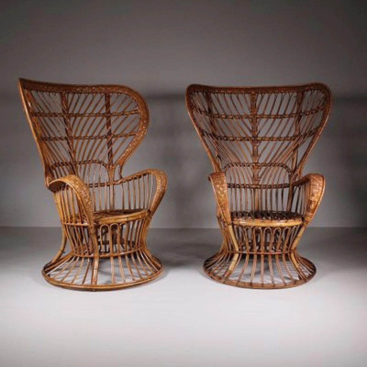 Pair of armchairs with wicker structure by Lio Carminati, 1950s 1
