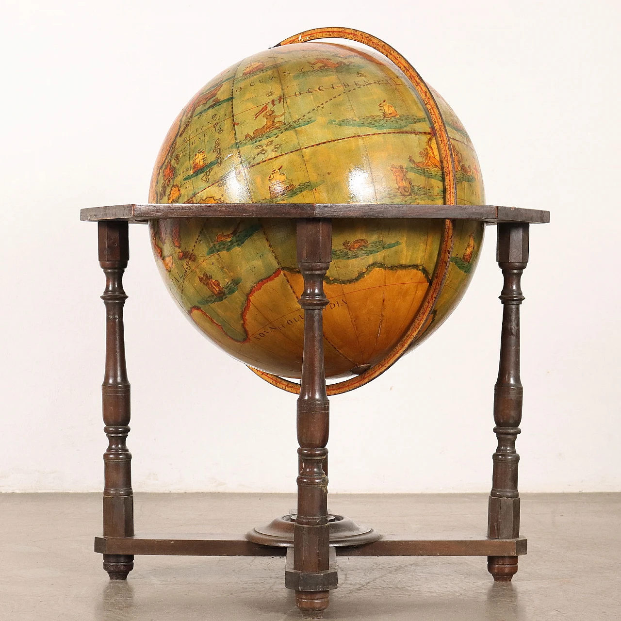 Wooden globe with turned uprights, early 20th century 10