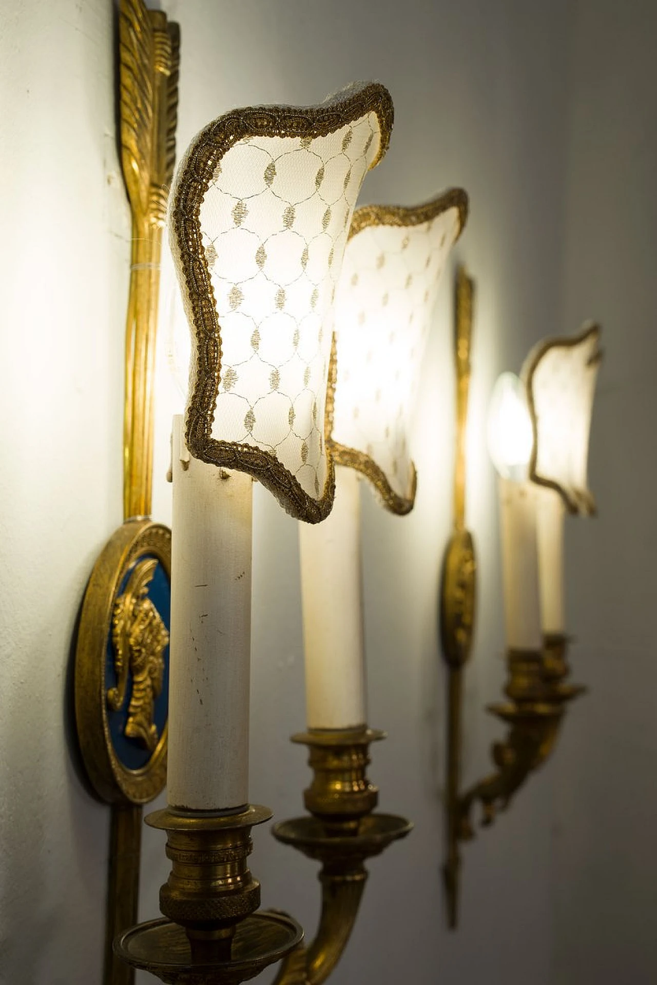 Pair of Neoclassical style bronze and fabric wall lights, 1940s 1