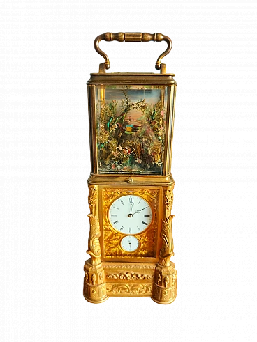 Bronze table clock with bird and automaton, mid-19th century