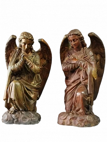 Pair of stucco and copper sculptures of praying angels, 18th century