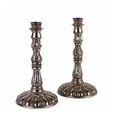 Pair of chiseled silver 900 candle holders with plant motifs