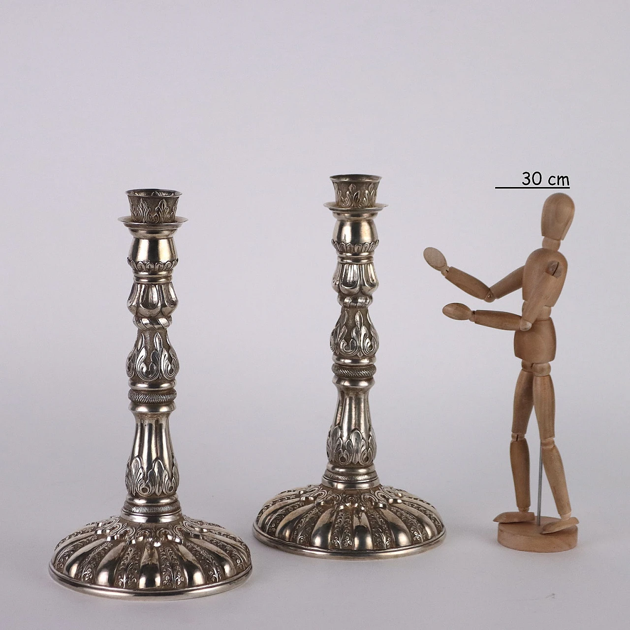 Pair of chiseled silver 900 candle holders with plant motifs 2