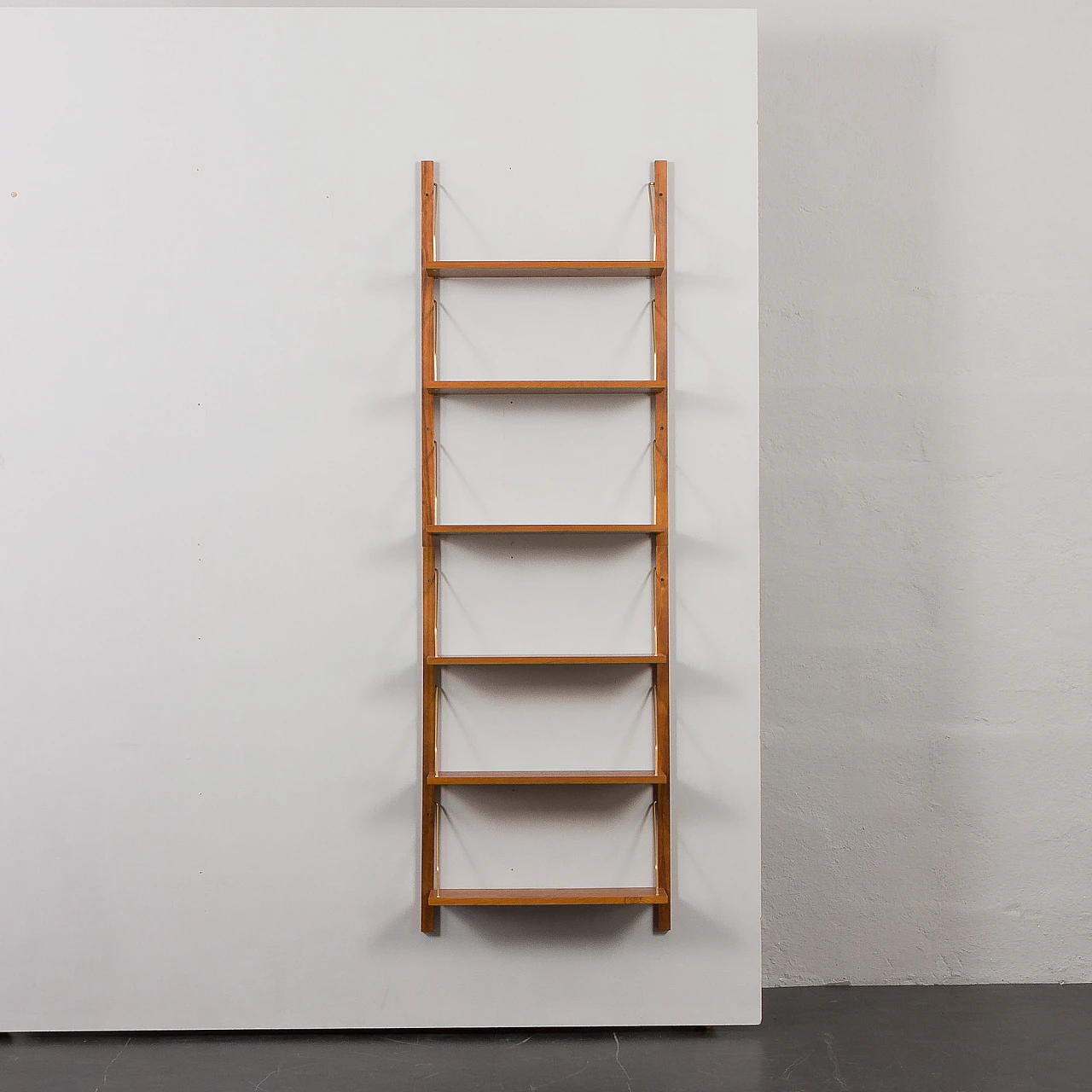 Teak and brass hanging bookcase in the style of Cadovius and Sorensen 6