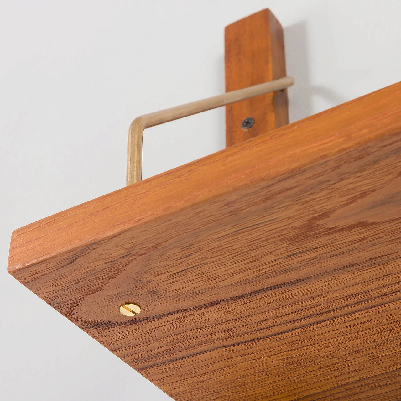 Teak and brass hanging bookcase in the style of Cadovius and Sorensen 9