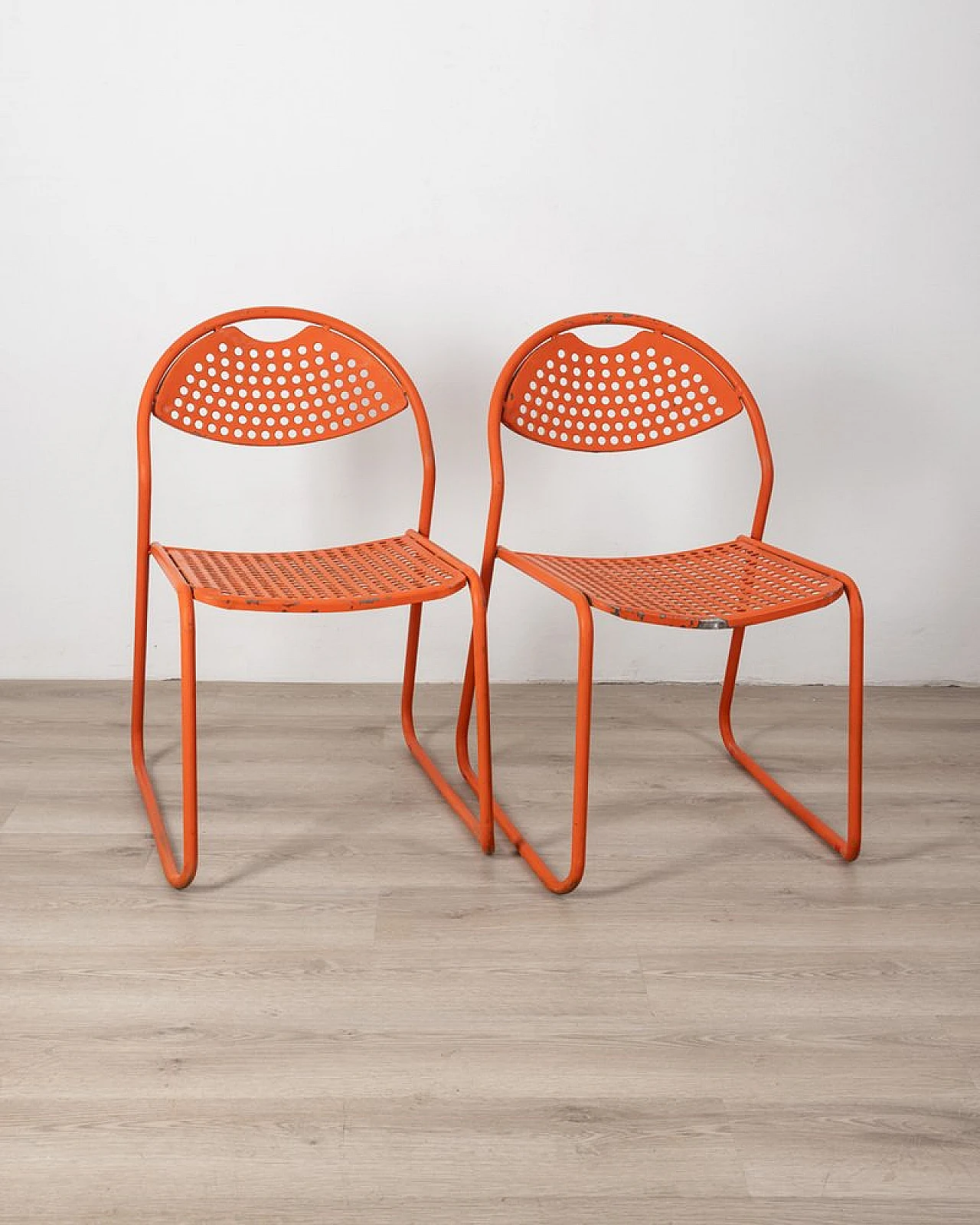 Pair of orange garden chairs in iron, 1970s 1