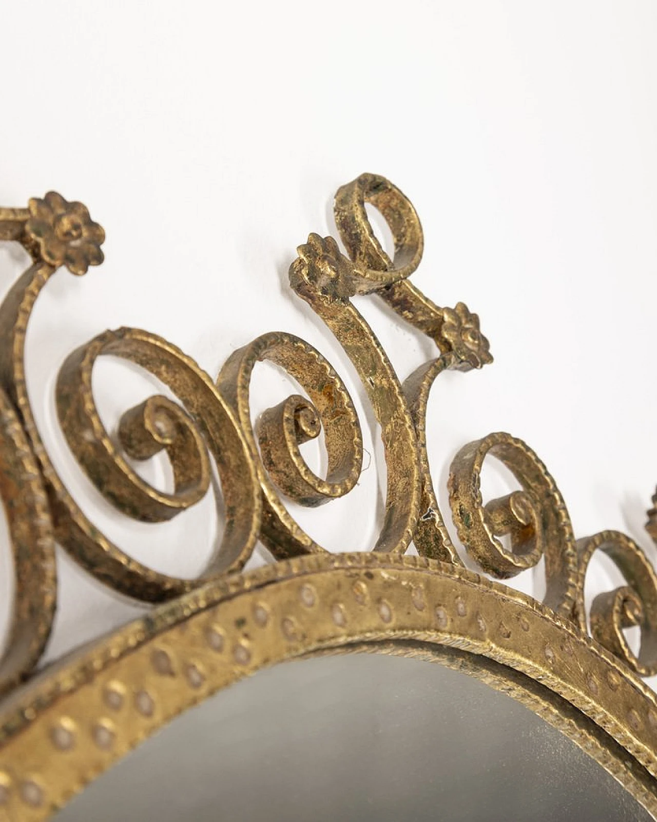 Wall mirror in worked golden iron by Pier Luigi Colli, 1950s 5