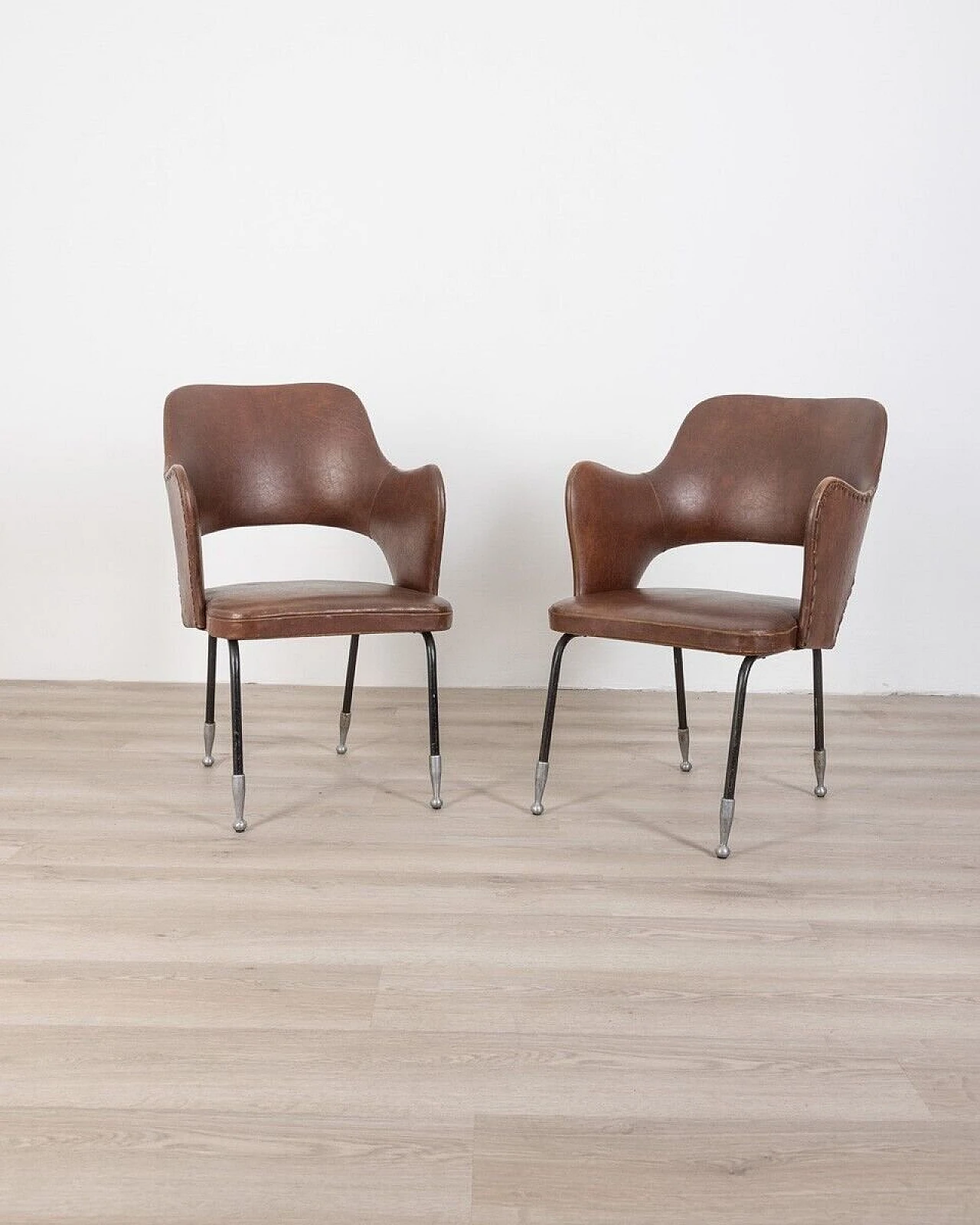 Pair of armchairs in brown leather and black metal legs, 1960s 1