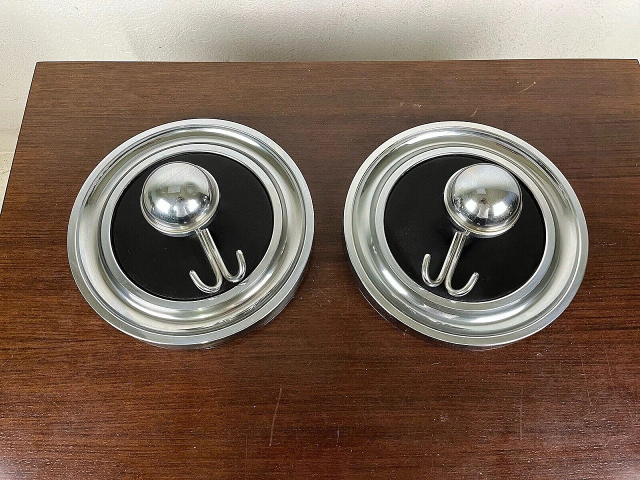 Pair of chromed metal and leather wall coat racks, 1960s 1