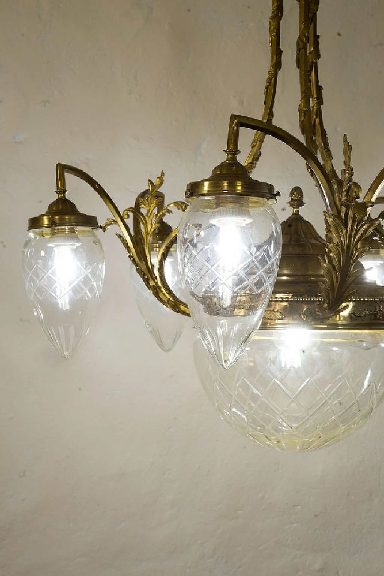 Art Nouveau brass and crystal chandelier, 1920s 8