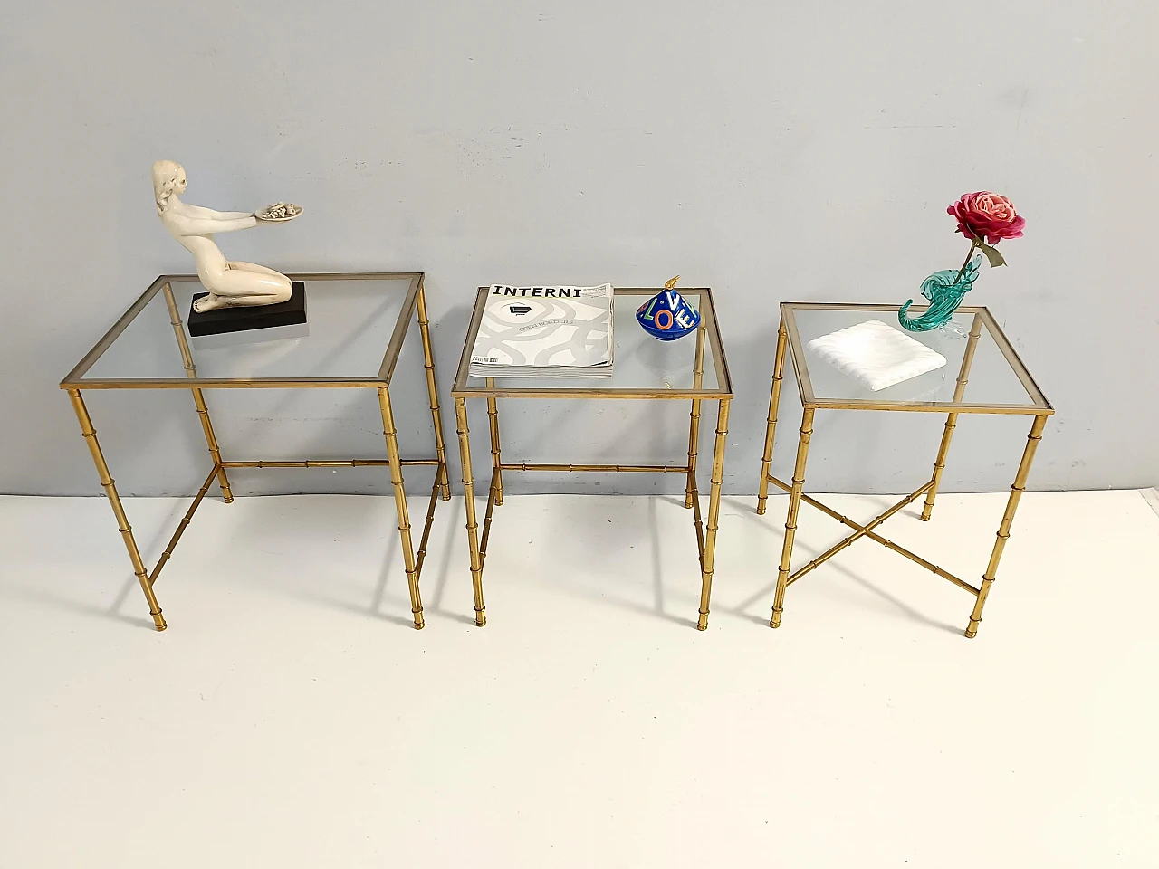 3 Nesting tables in brass and glass in the style of J. Adnet, 1960s 2