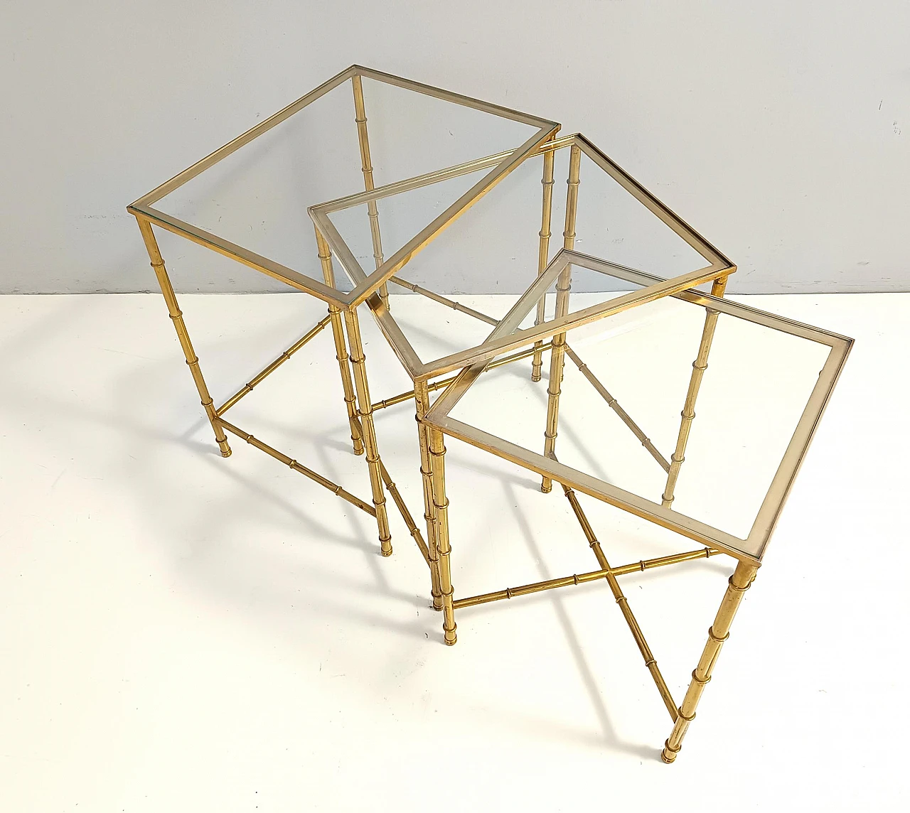 3 Nesting tables in brass and glass in the style of J. Adnet, 1960s 5